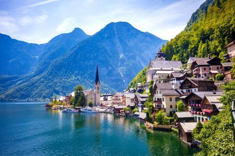 View of Hallstatt village with lake and Alps behind, Austria